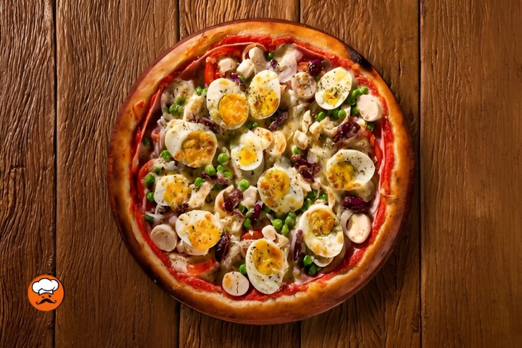 Pizza portuguesa con huevo aceitunas palmito y guisantes