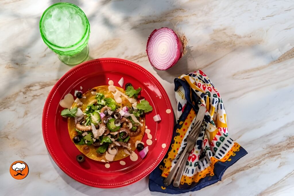 Taco de pulpo mexicano con salsa fresca en tortilla de maíz