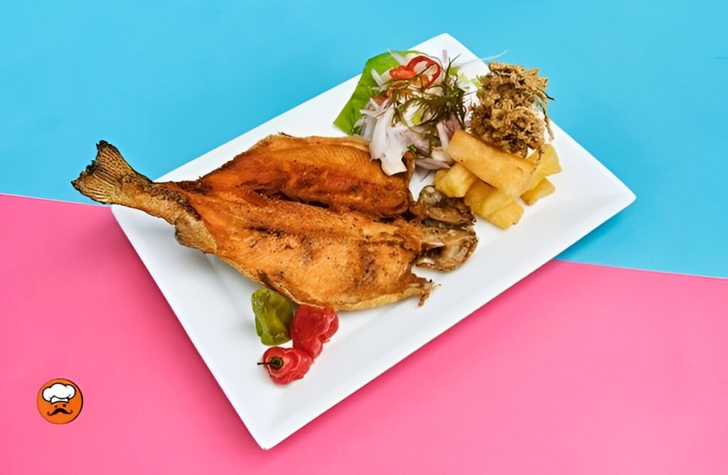 trucha frita con arroz y yuca