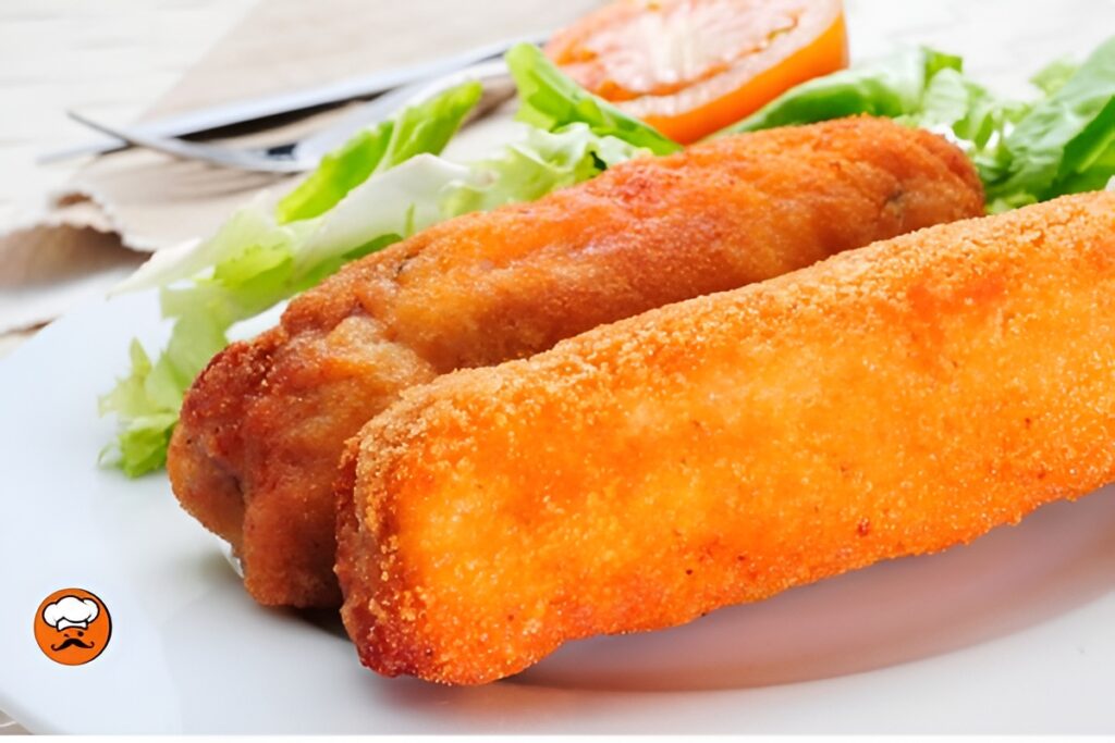 Flamenquines de cerdo empanados con jamón serrano dorados