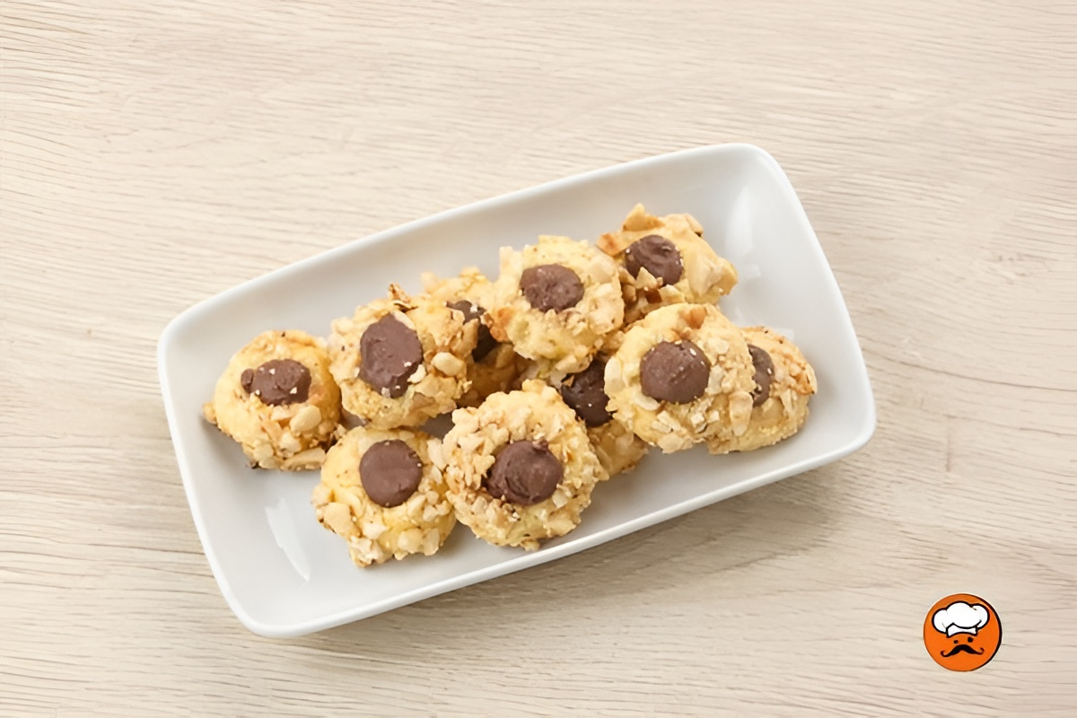 Galletas caseras de mantequilla rellenas con Nutella y almendras
